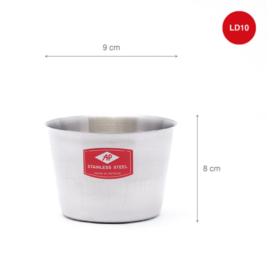 A stainless steel ice glass cup size 10 with splashed ice cubes inside bright and clean surface studio white background