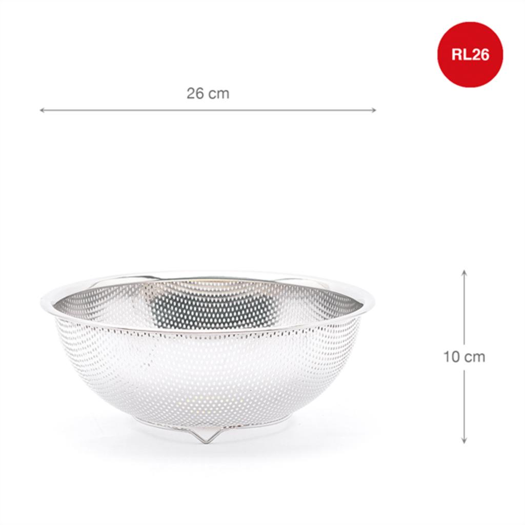 A stainless steel mesh basket with 26cm diameter placed on a kitchen counter with fresh vegetables inside