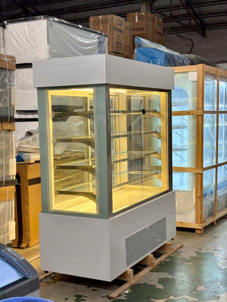 comparison table showing features of different 5-tier refrigerated cake display cabinets